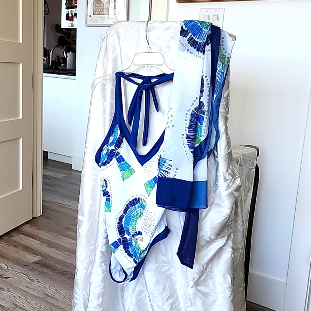 One-piece swimsuit with matching wrap around cover-up.